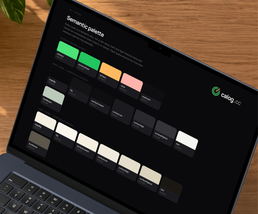 The calog semantic palette on a laptop: accents and dark and light theme surfaces