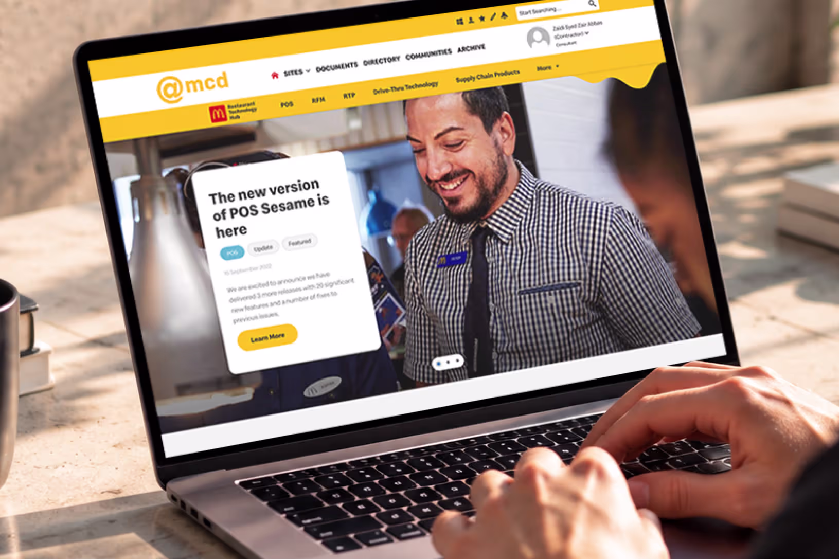 Hub home page: the Unily @mcd header on top, the yellow Restaurant Technology Hub sub-navigation below it with a melted-cheese drip
