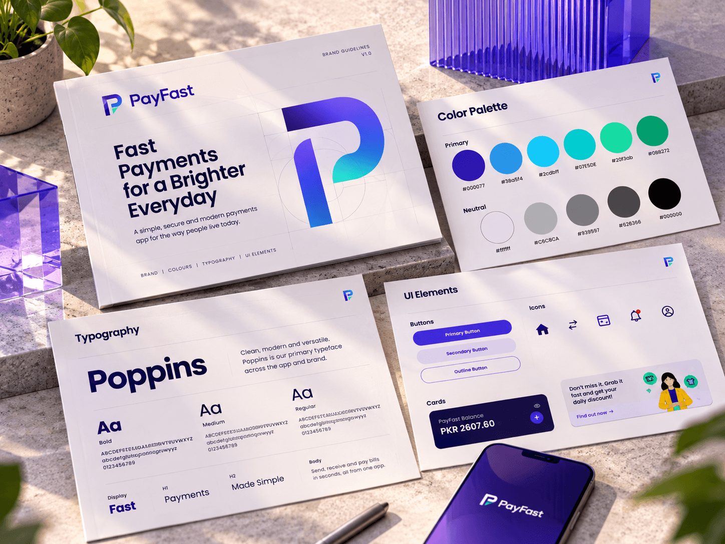 PayFast brand guide sheets on a sunlit stone ledge: the cover with the P mark, the colour palette from indigo to green with neutrals, Poppins in bold, medium and regular, and UI elements with buttons, icons, the balance card and the daily discount card, beside a phone showing the PayFast splash